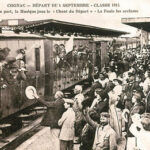 début septembre 14, sur le quai de gare, la foule encourage les soldats enthousiastes qui partent au combat.